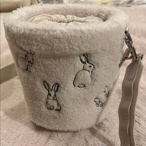 Lululemon Plush Bunny Crossbody Bucket Bag in Cream